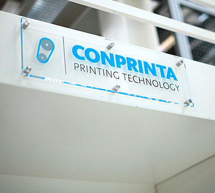 Conprinta sign on Conprinta machine with contact details