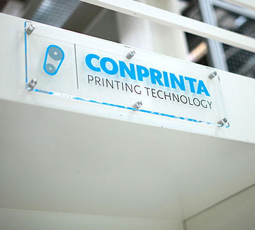 Conprinta sign on Conprinta machine with contact details