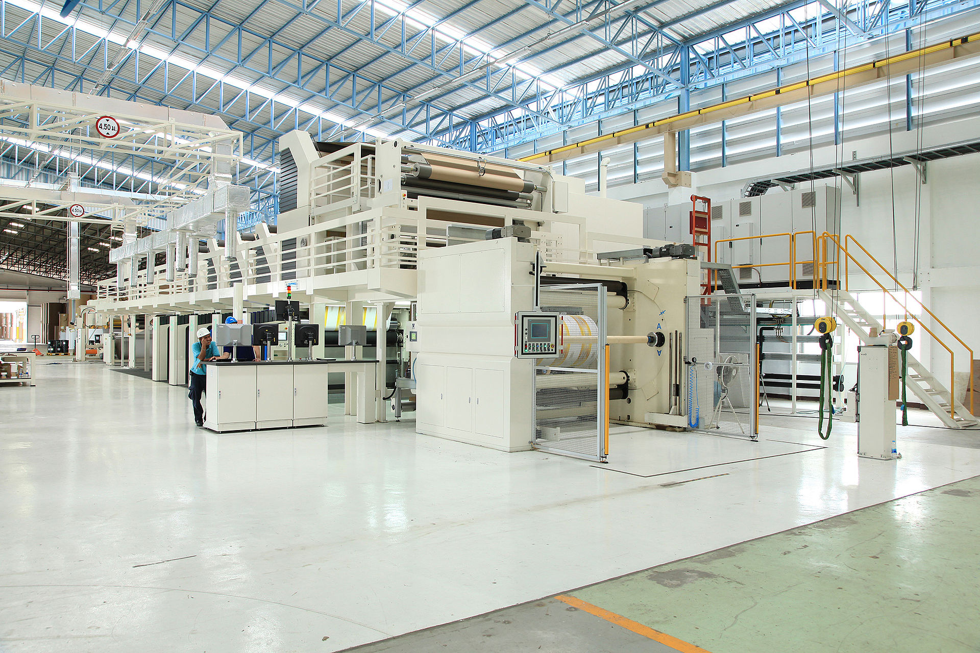 The CONPRINTA IMD press at customers site, winding a printed paper roll.